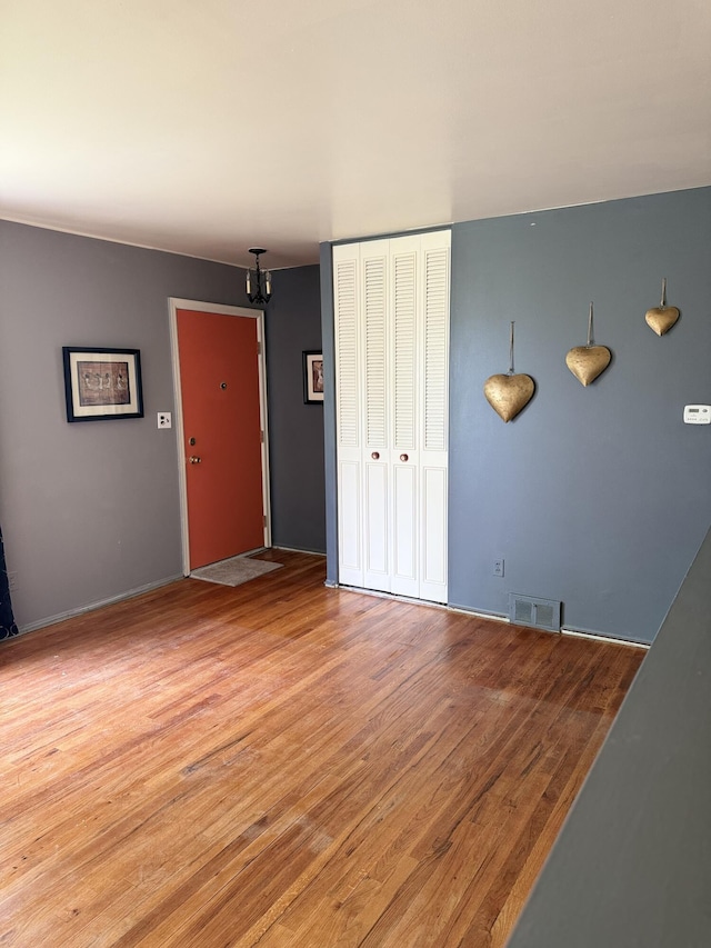 unfurnished living room featuring light wood finished floors