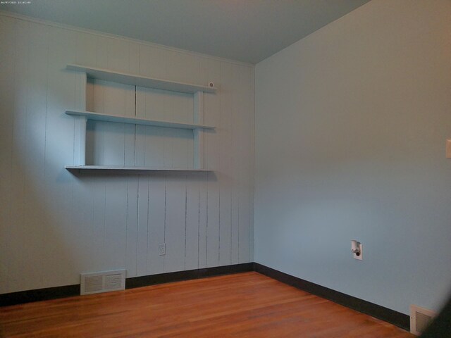 21423 Scotia Ln, Ferndale, MI 48220 - unfurnished room with dark wood-style floors and baseboards
