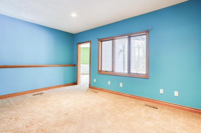 4390 104th St SW, Byron Center, MI 49315 - carpeted empty room with baseboards and recessed lighting