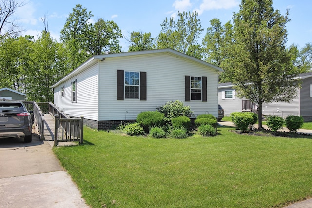 29878 Meadow Ln, Gibraltar, MI 48173 - view of front of home with a front lawn