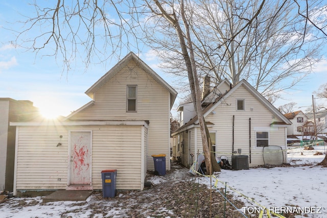 1402 N Ave NE, Grand Rapids, MI 49505 - snow covered property featuring central air condition unit