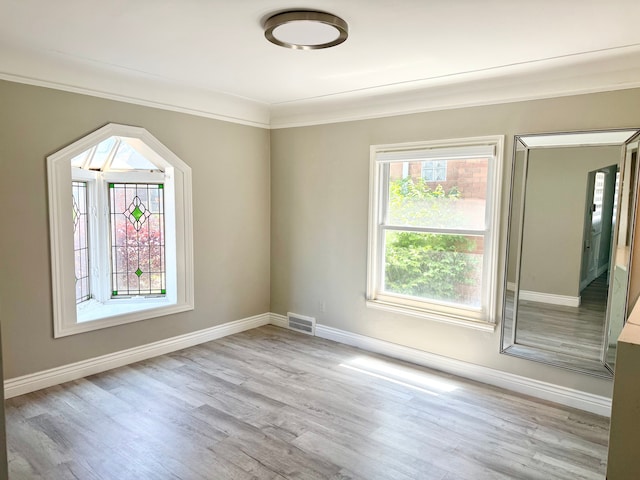 4775 Orchard Ave, Dearborn, MI 48126 - spare room with wood finished floors, ornamental molding, and baseboards