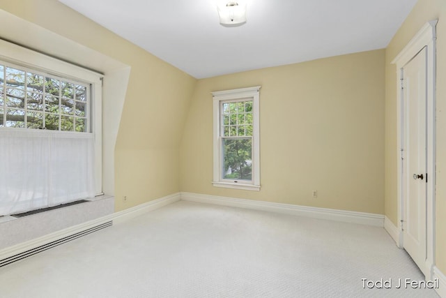 554 Madison Ave SE, Grand Rapids, MI 49503 - unfurnished room featuring carpet flooring and baseboards