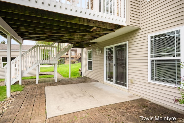 view of patio / terrace featuring stairway