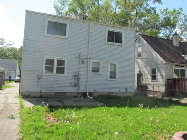 18478 Fox, Redford, MI 48240 - rear view of house with a yard and a chimney