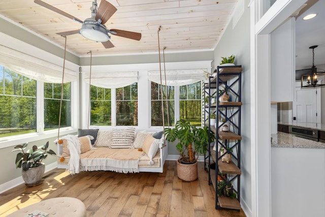 9510 Sparta Ave NW, Sparta, MI 49345 - sunroom / solarium featuring wooden ceiling, wood-type flooring, and baseboards