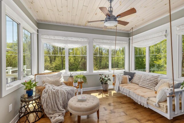 9510 Sparta Ave NW, Sparta, MI 49345 - sunroom / solarium with ceiling fan, hardwood / wood-style flooring, baseboards, wood ceiling, and crown molding