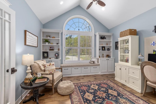 9510 Sparta Ave NW, Sparta, MI 49345 - office area featuring vaulted ceiling, ceiling fan, and wood finished floors