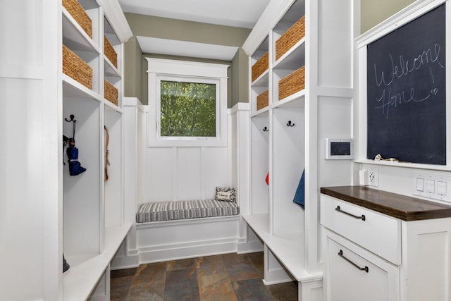 9510 Sparta Ave NW, Sparta, MI 49345 - mudroom with dark stone finish flooring