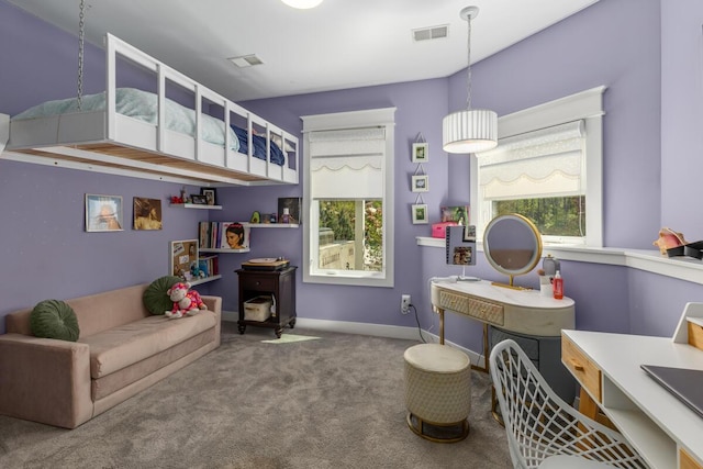 9510 Sparta Ave NW, Sparta, MI 49345 - interior space with carpet floors, healthy amount of natural light, baseboards, and a wood stove