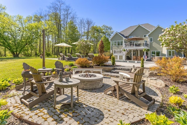 9510 Sparta Ave NW, Sparta, MI 49345 - view of patio with a fire pit, a balcony, and stairway