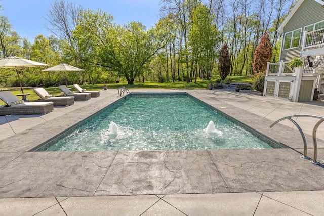 9510 Sparta Ave NW, Sparta, MI 49345 - swimming pool featuring a patio area