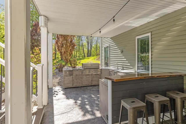 9510 Sparta Ave NW, Sparta, MI 49345 - view of patio with grilling area and exterior kitchen