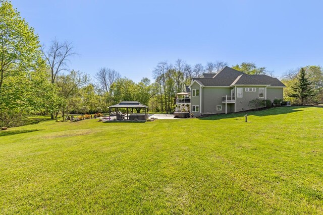 9510 Sparta Ave NW, Sparta, MI 49345 - view of green lawn featuring a gazebo and a detached carport