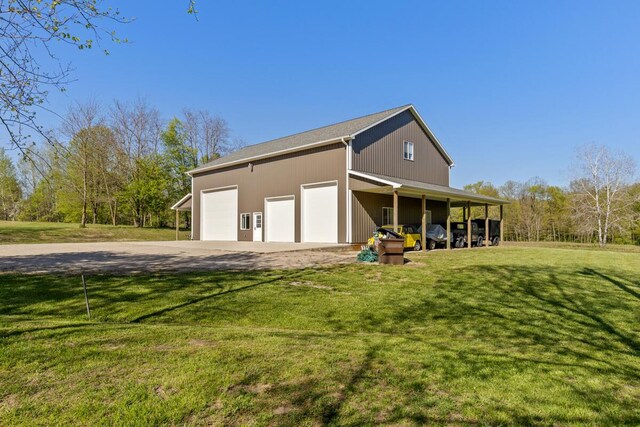 9510 Sparta Ave NW, Sparta, MI 49345 - view of pole building with a yard and driveway