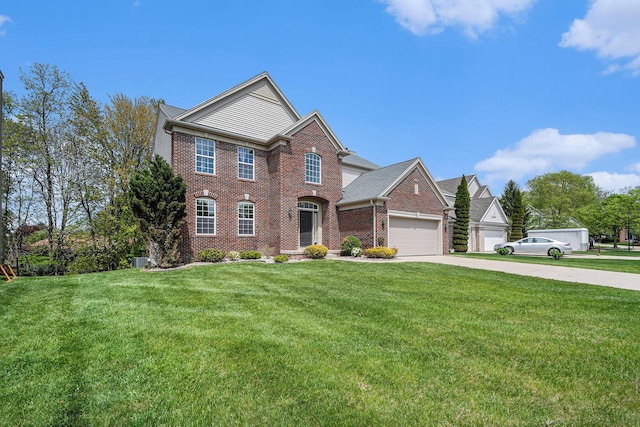 2570 Black Horse Ct NE, Grand Rapids, MI 49505 - colonial-style house with brick siding, a garage, driveway, and a front yard