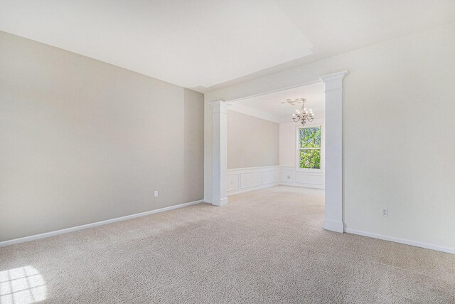 2570 Black Horse Ct NE, Grand Rapids, MI 49505 - unfurnished room featuring a chandelier and light colored carpet