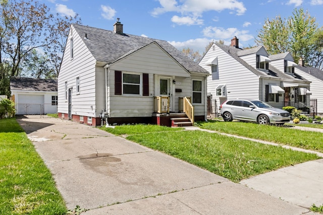 18750 Kingsville St, Harper Woods, MI 48225 - bungalow-style home with a front lawn, a chimney, roof with shingles, and driveway