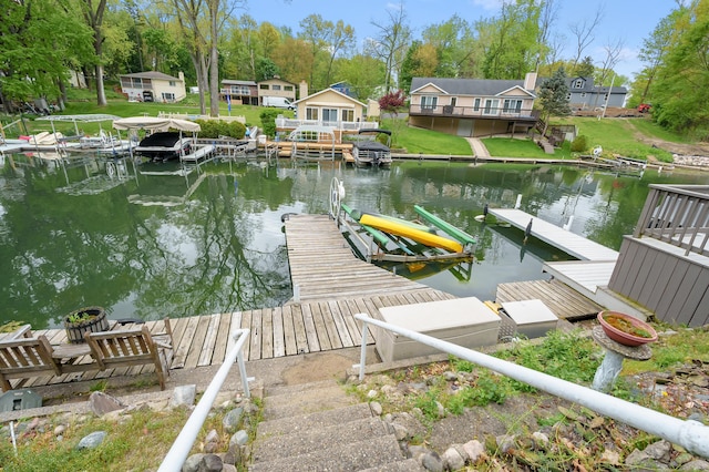 dock with a water view and a residential view