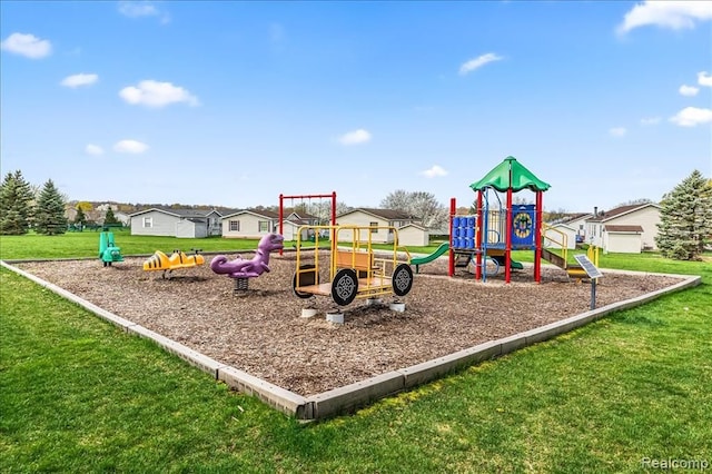 communal playground with a lawn