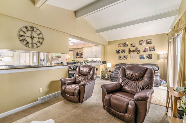 living room featuring carpet and baseboards