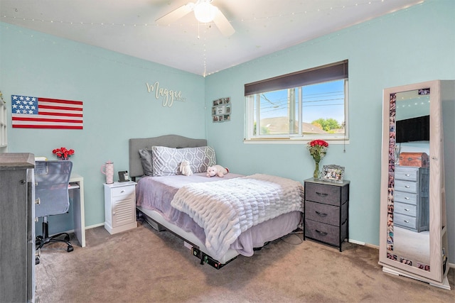 bedroom with carpet floors, baseboards, and ceiling fan