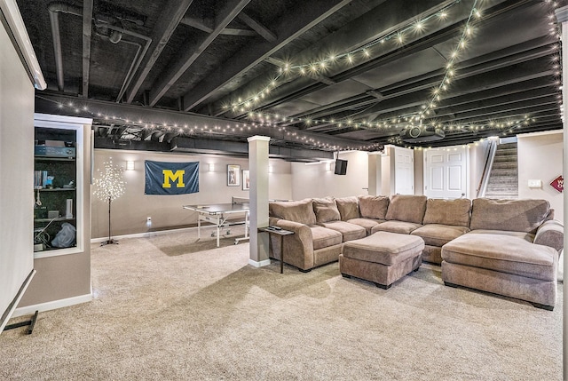 carpeted living area featuring stairs and baseboards