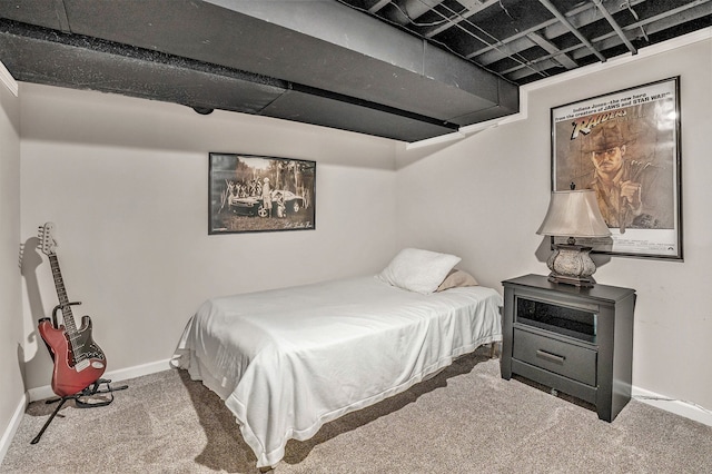 carpeted bedroom with baseboards