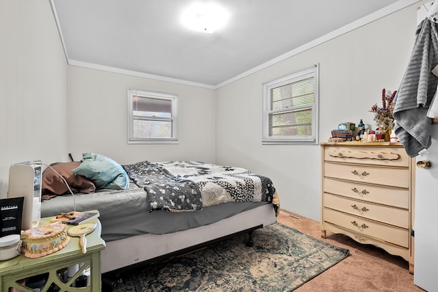 carpeted bedroom featuring ornamental molding and multiple windows