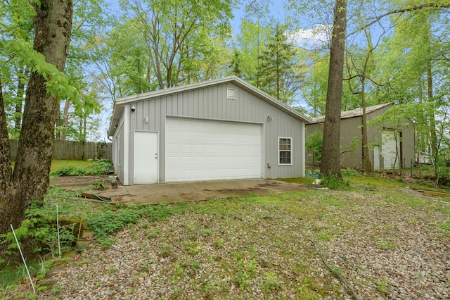 detached garage with fence