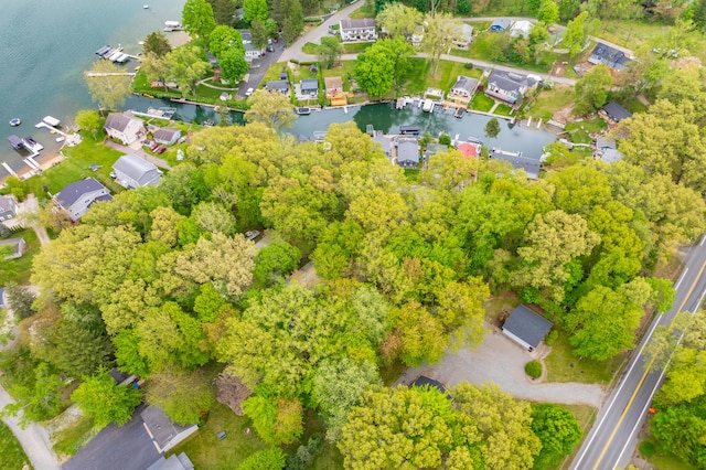 aerial view of property's location featuring a large body of water