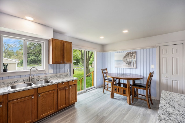 44080 Davis, Utica, MI 48317 - kitchen featuring a sink, brown cabinetry, plenty of natural light, and recessed lighting