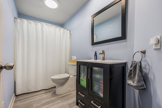 44080 Davis, Utica, MI 48317 - bathroom with wood finished floors, toilet, vanity, and a shower with curtain