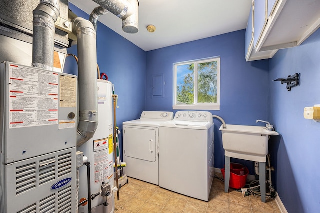 44080 Davis, Utica, MI 48317 - laundry room with cabinet space, water heater, and separate washer and dryer