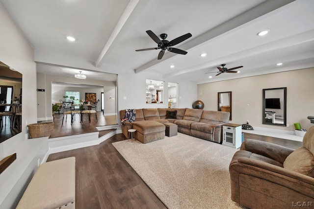 608 Budlong St, Adrian, MI 49221 - living area with dark wood finished floors, a ceiling fan, beam ceiling, recessed lighting, and baseboards