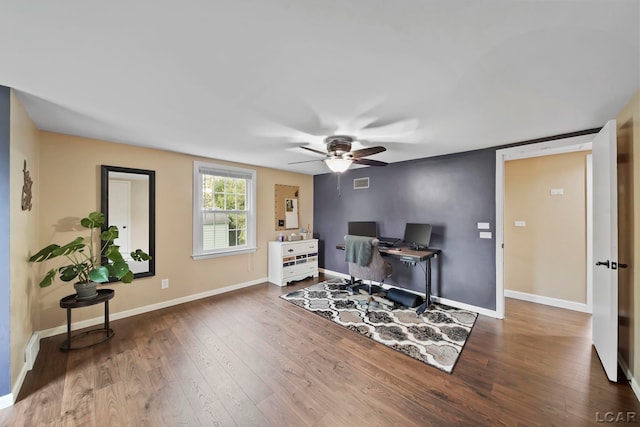 608 Budlong St, Adrian, MI 49221 - office featuring ceiling fan, wood finished floors, and baseboards
