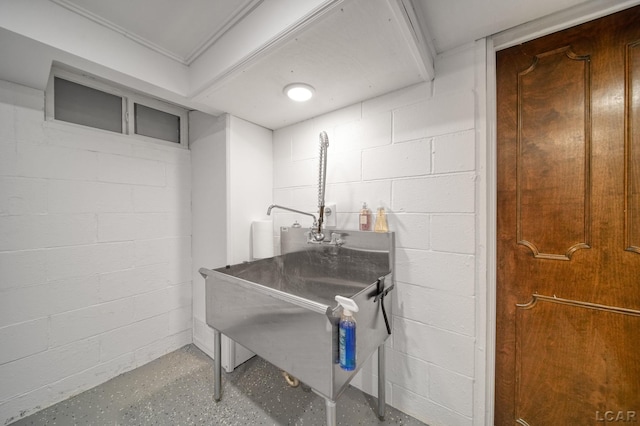608 Budlong St, Adrian, MI 49221 - washroom featuring concrete block wall