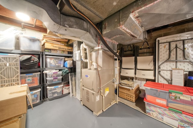 608 Budlong St, Adrian, MI 49221 - unfinished below grade area featuring heating unit