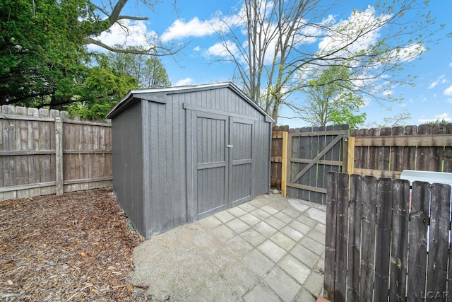 608 Budlong St, Adrian, MI 49221 - view of shed with a fenced backyard
