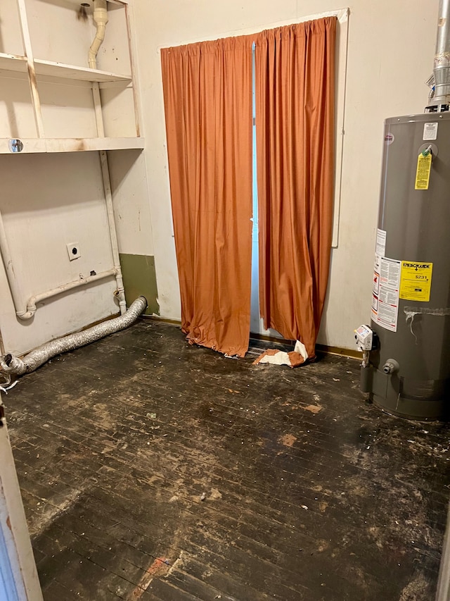 interior space with electric dryer hookup and gas water heater