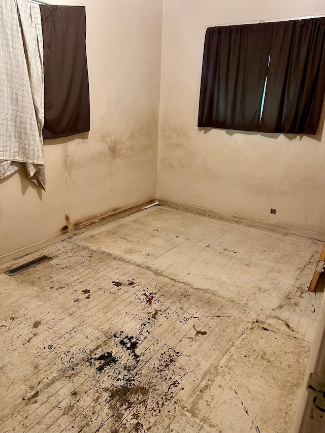 2209 Kansas Ave, Flint, MI 48506 - spare room with baseboards