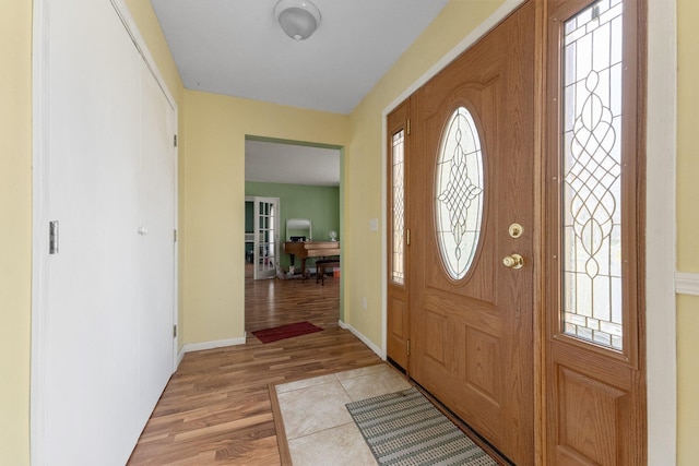 512 Kalkaska Rd NW, Kalkaska, MI 49646 - entryway with light wood-type flooring and baseboards