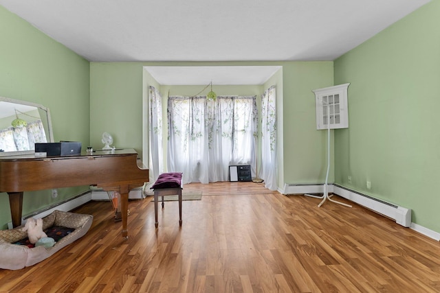 512 Kalkaska Rd NW, Kalkaska, MI 49646 - living area with plenty of natural light, wood finished floors, and baseboards