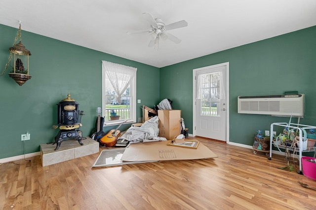 512 Kalkaska Rd NW, Kalkaska, MI 49646 - rec room featuring healthy amount of natural light, wood finished floors, and ceiling fan