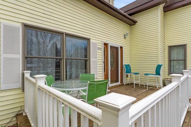 512 Kalkaska Rd NW, Kalkaska, MI 49646 - deck featuring outdoor dining area