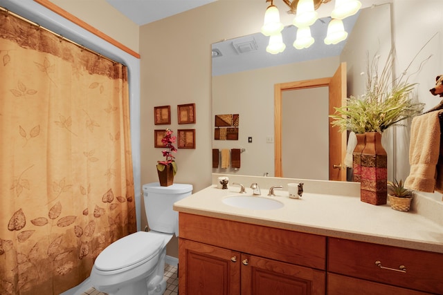 7017 Loud Dr, Oscoda, MI 48750 - bathroom with vanity, toilet, tile patterned flooring, and a chandelier