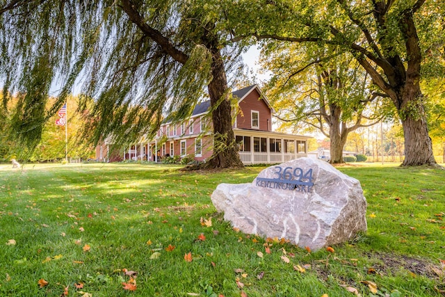 3694 Kerlikowske Rd, Coloma, MI 49038 - view of green lawn featuring a sunroom