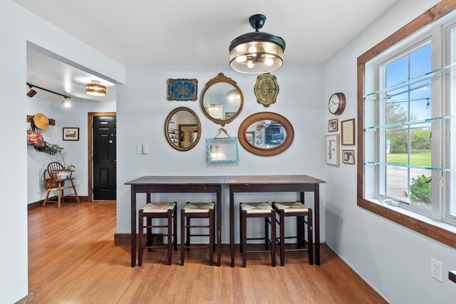 3694 Kerlikowske Rd, Coloma, MI 49038 - dining area featuring wood finished floors, healthy amount of natural light, and baseboards