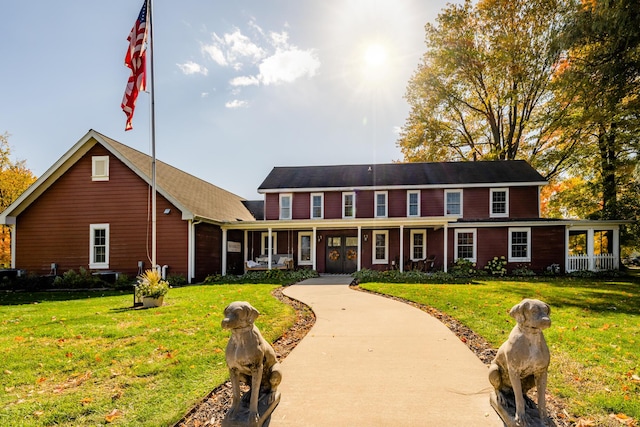 3694 Kerlikowske Rd, Coloma, MI 49038 - view of front of home featuring a front lawn and covered porch