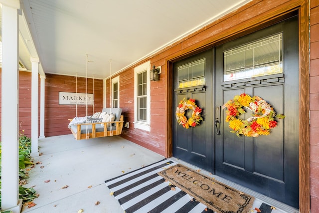 3694 Kerlikowske Rd, Coloma, MI 49038 - property entrance featuring a porch and french doors